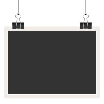 old empty photo with binder clips hanging at black twine
