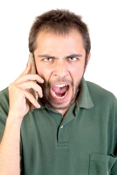 Angry young man with cellphone doing funny faces isolated in white