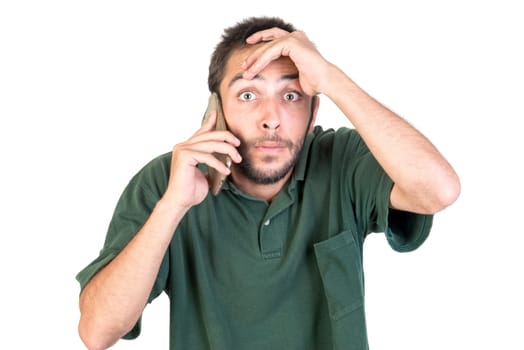 young man with cellphone doing funny faces isolated in white