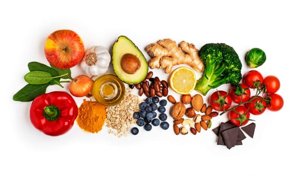 Selection of healthy food on white background. Healthy diet foods for heart, cholesterol and diabetes.