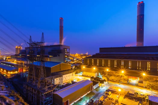 Hong Kong power station at sunset , Glow light of petrochemical industry