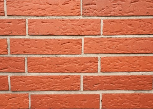Red old brick wall using as background