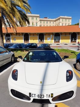 San Remo, Italy - March 5, 2017: White Ferrari F430 Spider F430 Parked in The Street Of San Remo