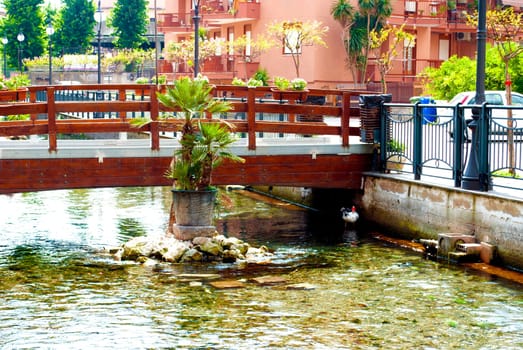 Pedestrian bridge across the river. City of Scafati, Italy. Architecture of a small southern Italian town.