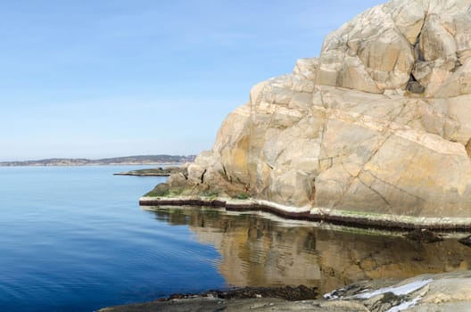the sun is shining on the rock a winterday on swedish west-coast