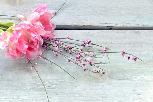 pink tulips on wooden background white shabby
