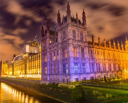 Houses of Parliament Thames River Westminster Bridge Night  Westminster London England.  Named after the Bell in the Tower. Has kept exact time since 1859.