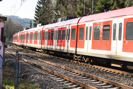 Essen Kettwig,Nrw,Germany - February 12,2016:. Level crossing in Essen Kettwig an der Ruhr at the Kattenturm. Passing fast train in the direction of Duesseldorf..