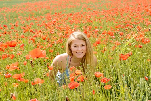 Woman in the poppy field