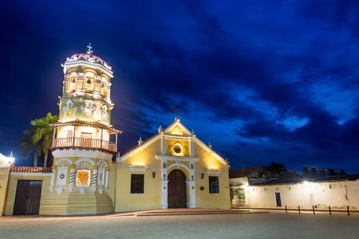Santa Barbara church with a beautiful deep blue sky taken at night in Mompox, Colombia