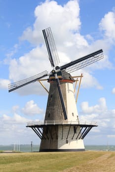 A beautiful old historic windmill,with four wings.