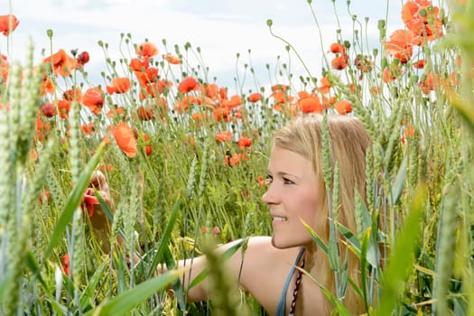 Woman in the poppy field