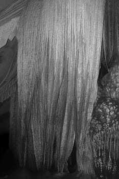 cave stalagmites formations wall black white