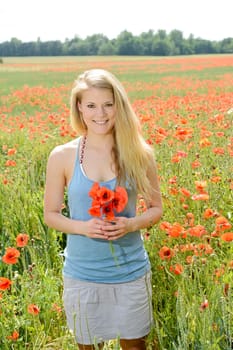 Woman in the poppy field