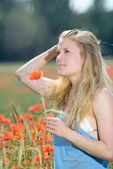 Woman in the poppy field