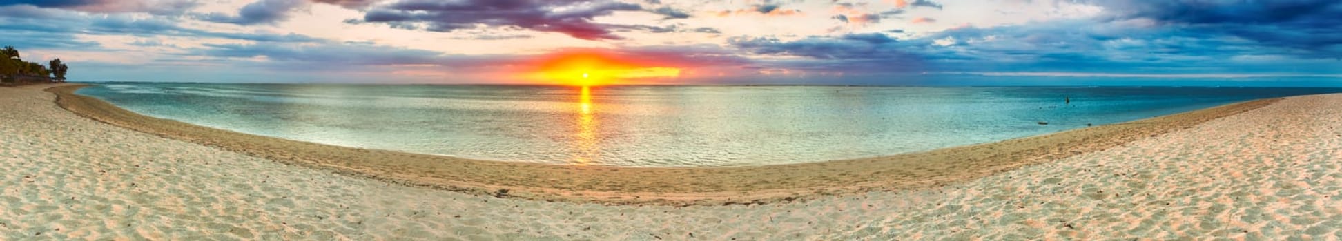 White sandy beach Le Morne at sunset. Mauritius. Panorama