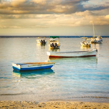 Fishing boats at sunset time.  Mauritius.