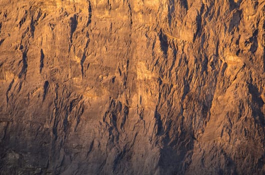 Stone texture on a mountain face in early morning light, Ha Ling Peak, Canmore, Alberta, Canada