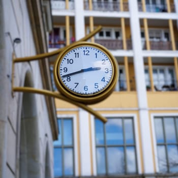 Clock on the façade of a house in Magdeburg