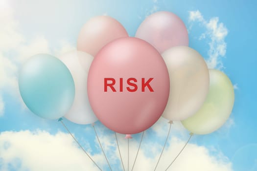 risk on balloon with blue sky background