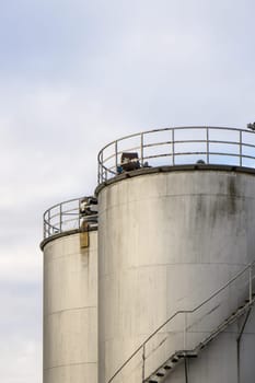 Industrial silos. Tall and with external staircase