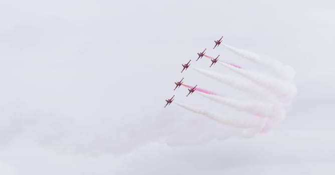 LEEUWARDEN, NETHERLANDS - JUNE 6, 2016: Turkish Star air force demonstration tean performing their stunts during the Dutch Air Force open days