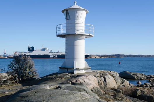 one lighthouse on sweden west-coast standing on a cliff