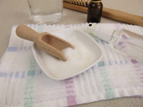 Homemade hairspray made from sugar water and essential oil