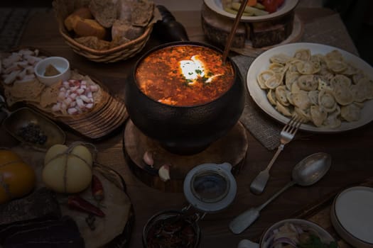 Russian food: borsch pickles cheese meat dumplings and fat