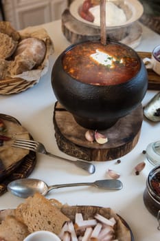 Russian food: borsch pickles cheese meat dumplings and fat