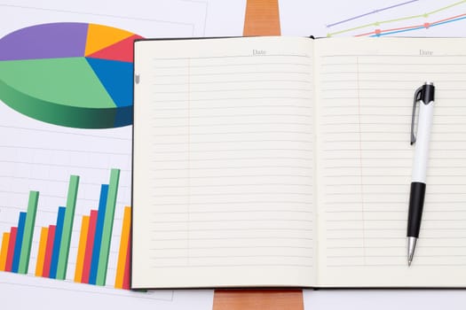 Color chart printed documents with opened notebook