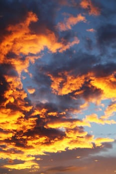 orange and blue dramatic sky with clouds for abstract background