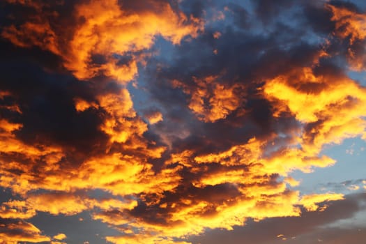 Colorful orange and blue dramatic sky with clouds for abstract background