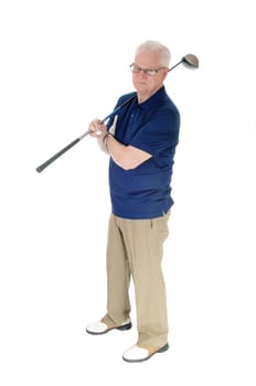 A handsome older senior practicing golf at his home standing isolated.for white background with the iron over his shoulder..