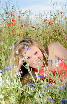 young woman on a meadow