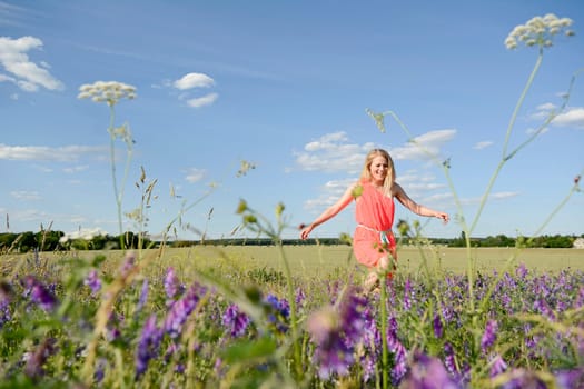 young woman on flower meadow