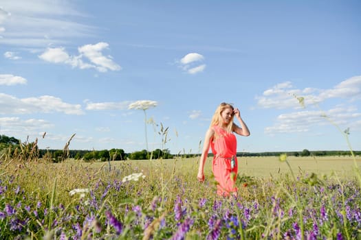 young woman on flower meadow