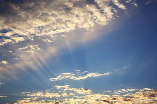 Beautiful heavenly landscape with the sun in the clouds