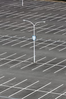 Car parking lot with white mark, light pole