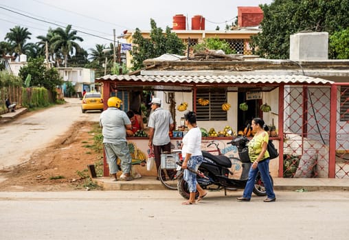 Havana, Cuba - January 14, 2016: Typical scene in the streets of Havana, Small private shop stall selling vegetables and fruit from the owner's own field. This is sold outside the State rationing of food