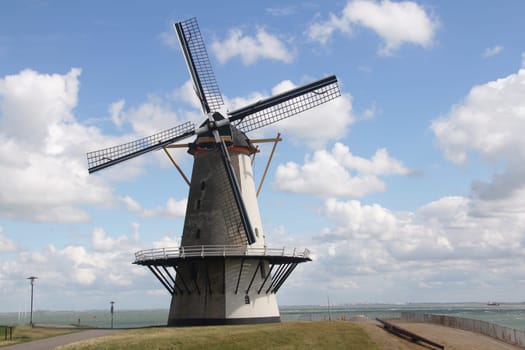 A beautiful old historic windmill,with four wings.