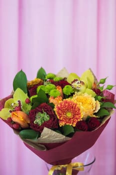 beautiful wedding bouquet on pink background
