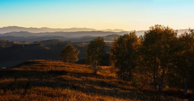 Beauty sunset in the mountains in Altay, panoramic picture