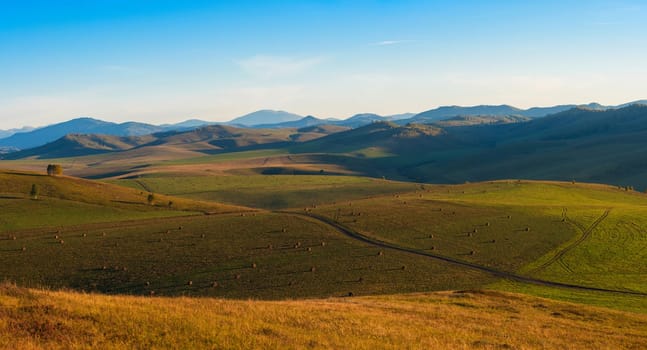 Beauty summer evening in the mountains in Altay, panoramic picture
