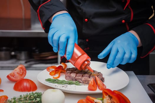 Chef set grilled meat steak on the plate