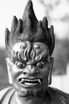 chinese  cultural golden sculpture red eyes and  hair black white