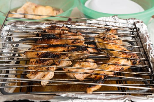 roast chicken during village festival in Sicily
