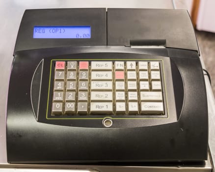 Cash Register in business' commercial sicilian Italian