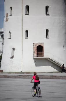 The old Town of the City Vilnius with the clocktower and the Johanneschurch in the Baltic State of Lithuania