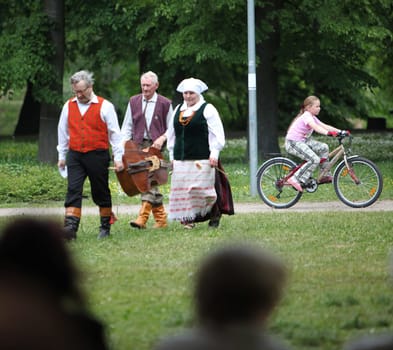 People in a Parc in the old City of Vilnius in the Baltic State of Lithuania